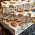 Turrón de Almendra: Tradición, Historia y Receta para Endulzar la Navidad  El turrón de almendra es uno de los dulces más emblemáticos de la Navidad